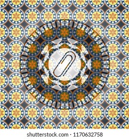paper clip icon inside arabic emblem. Arabesque decoration.