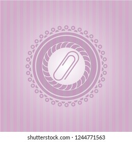 paper clip icon inside badge with pink background