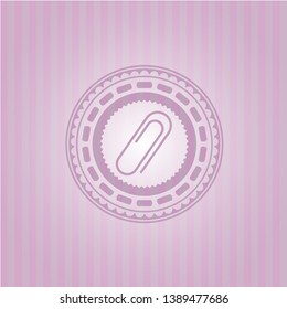 paper clip icon inside badge with pink background