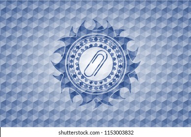 paper clip icon inside blue polygonal emblem.