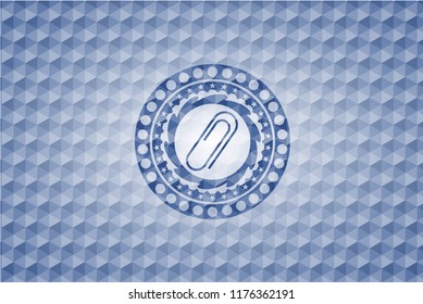 paper clip icon inside blue hexagon emblem.