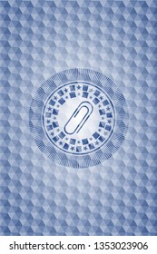 paper clip icon inside blue emblem or badge with geometric pattern background.