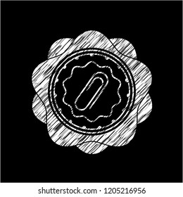 paper clip icon inside chalkboard emblem