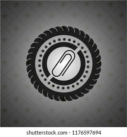 paper clip icon inside dark emblem
