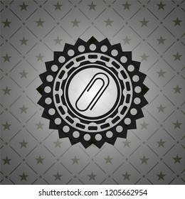 paper clip icon inside dark badge