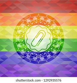 paper clip icon inside emblem on mosaic background with the colors of the LGBT flag