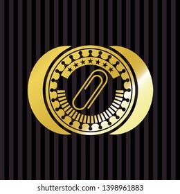 paper clip icon inside gold emblem