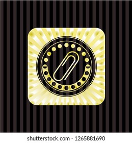 paper clip icon inside golden badge or emblem