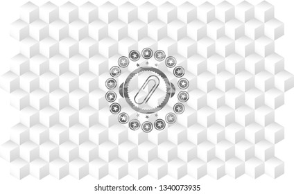 paper clip icon inside grey badge with geometric cube white background