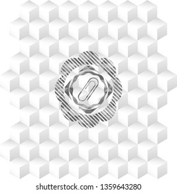 paper clip icon inside grey icon or emblem with geometric cube white background
