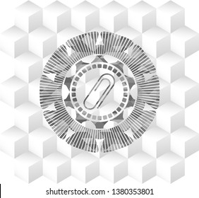 paper clip icon inside grey emblem with cube white background