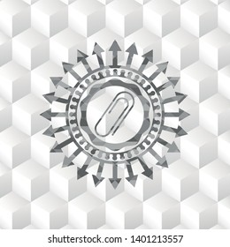 paper clip icon inside grey badge with geometric cube white background