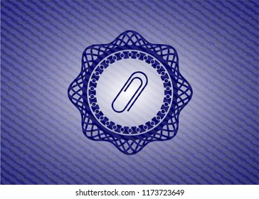 paper clip icon inside jean or denim emblem or badge background