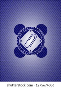 paper clip icon inside jean or denim emblem or badge background