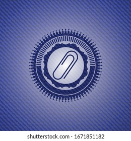 paper clip icon inside jean or denim emblem or badge background