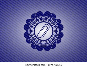 paper clip icon inside jean or denim emblem or badge background. 