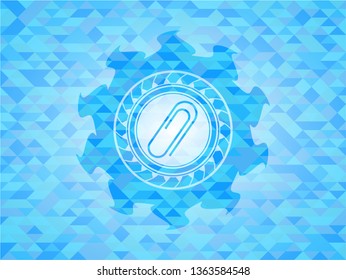 paper clip icon inside light blue mosaic emblem