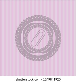 paper clip icon inside pink icon or emblem