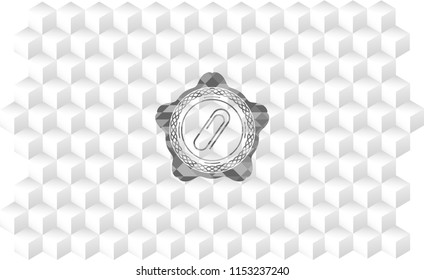 paper clip icon inside realistic grey emblem with cube white background