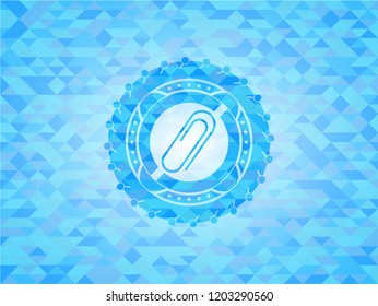 paper clip icon inside realistic light blue emblem. Mosaic background