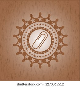 paper clip icon inside realistic wooden emblem