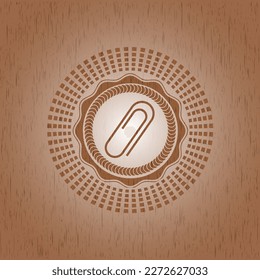 paper clip icon inside realistic wood emblem. 