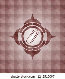 paper clip icon inside red seamless emblem or badge with abstract geometric polygonal pattern background.
