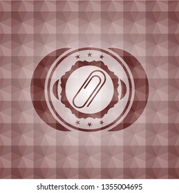 paper clip icon inside red seamless badge with geometric pattern.