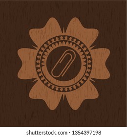 paper clip icon inside retro wooden emblem