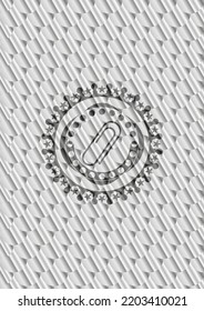 paper clip icon inside silver color badge. Scales pattern. Vector Illustration. Detailed. 
