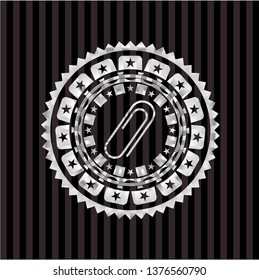paper clip icon inside silvery badge or emblem