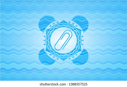 paper clip icon inside water representation style badge.