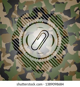 paper clip icon on camo pattern