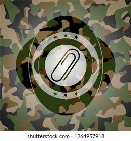paper clip icon on camouflage pattern