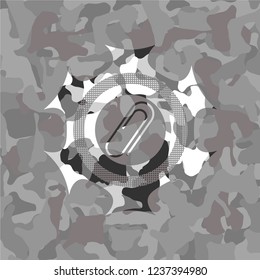 paper clip icon on grey camo texture