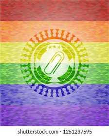 paper clip icon on mosaic background with the colors of the LGBT flag