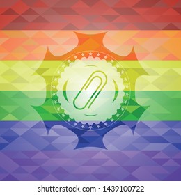 paper clip icon on mosaic background with the colors of the LGBT flag