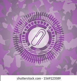 paper clip icon on pink and purple camo texture