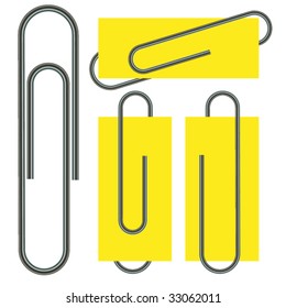 Paper clip isolated on paper