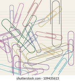 Paper Clip lying on lined paper.