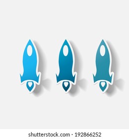Paper clipped sticker: rocket. Isolated illustration icon