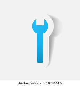 Paper clipped sticker: wrench. Isolated illustration icon