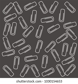 paper clips on a dark gray background