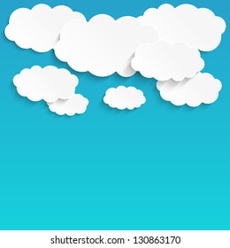 Paper clouds background with place for text