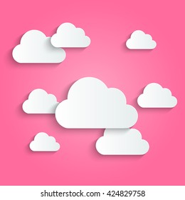 Paper clouds on pink background
