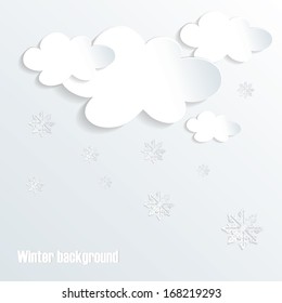 Paper clouds with snowflakes.