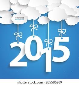 Paper clouds with text 2015 on the blue background. Eps 10 vector file.