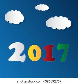 Paper clouds with text 2017 on the blue background. Eps 10 vector file.