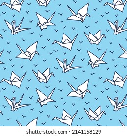 Paper crane hand drawn seamless pattern light blue background
