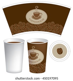 paper cup for hot drink on the background of coffee beans